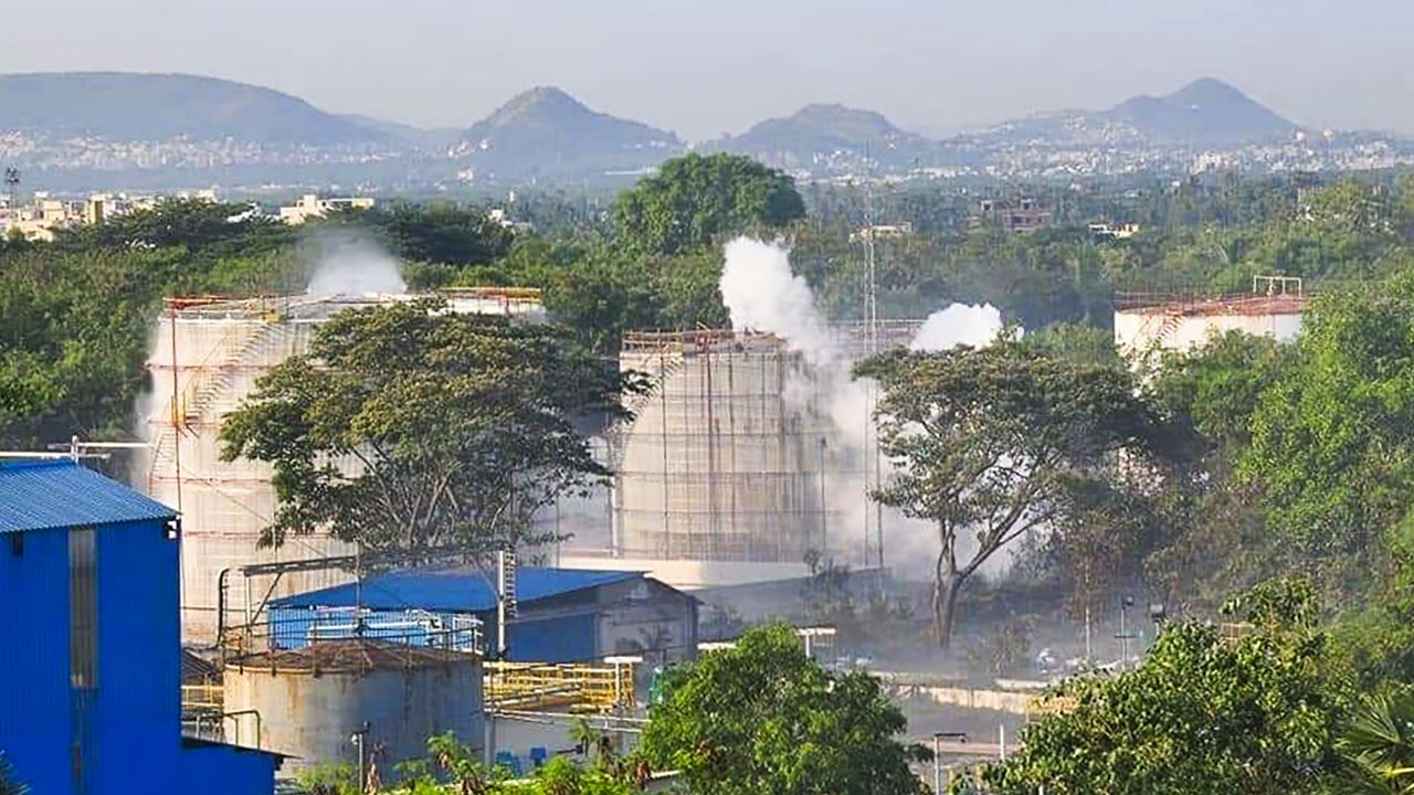 Smoke rises from the chemical plant after the leak.