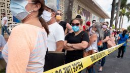 In early April, people lined up to apply for unemployment benefits in Hialeah, Florida, after the state labor agency's website struggled to keep up with an influx of claims. (Cristobal Herrera/EPA-EFE/Shutterstock) 