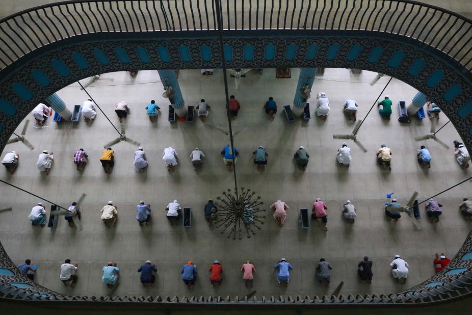 Muslims maintain social distancing as they offer prayers at the Baitul Mukarram National Mosque in Dhaka, Bangladesh, on May 7.