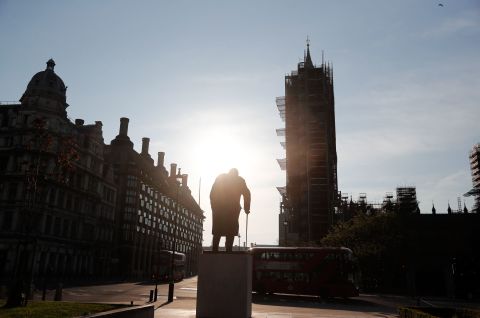The statue of Britain's wartime prime minister, Winston Churchill, stands in an almost empty Parliament Square in London. To mark the anniversary of VE Day, the BBC has said it will rebroadcast Churchill's speech declaring victory in Europe.