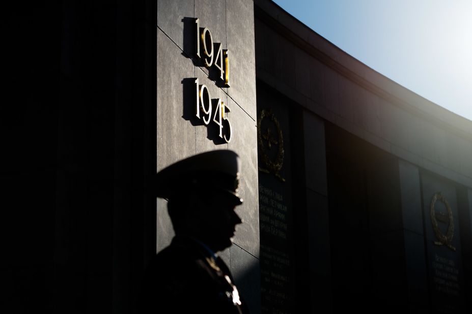 A Russian soldier stands at the Soviet War memorial in Berlin.