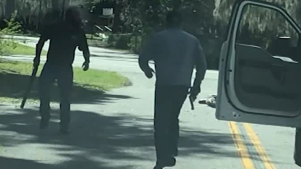 Ahmaud Arbery falls after being fatally shot in Satilla Shores on February 23.