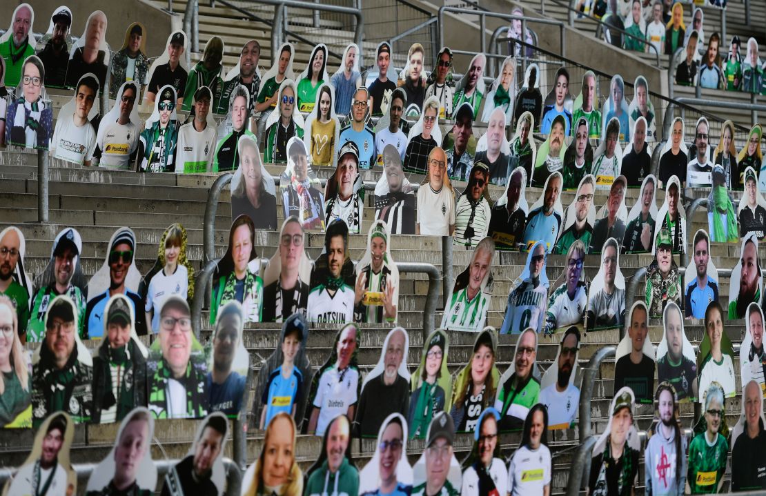 Cardboard cut-outs with portraits of Borussia Moenchegladbach's supporters are seen at the Borussia Park stadium.