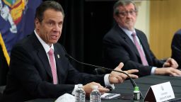 MANHASSET, NEW YORK - MAY 06:  New York Governor Andrew Cuomo speaks while President and CEO of Northwell Health Michael Dowling looks on during a Coronavirus Briefing At Northwell Feinstein Institute For Medical Research on May 06, 2020 in Manhasset, New York. (P