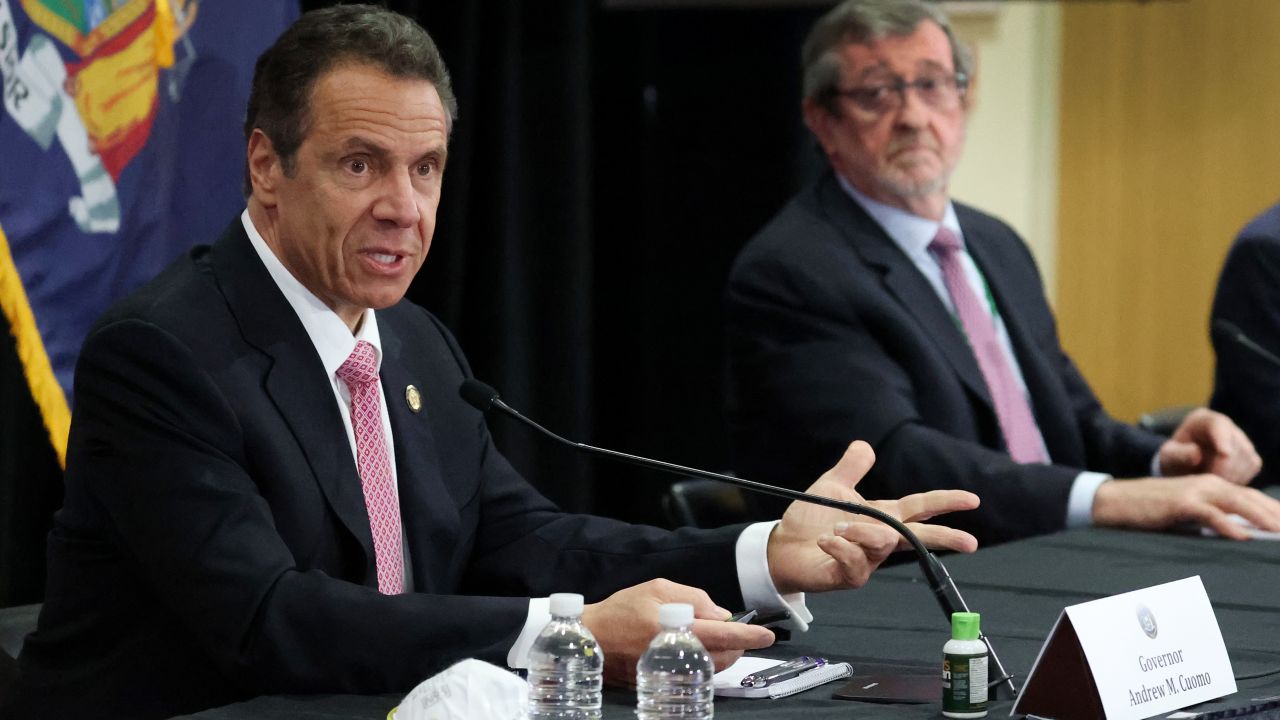 MANHASSET, NEW YORK - MAY 06: New York Governor Andrew Cuomo speaks while President and CEO of Northwell Health Michael Dowling looks on during a Coronavirus Briefing At Northwell Feinstein Institute For Medical Research on May 06, 2020 in Manhasset, New York. (Photo by Al Bello/Getty Images)