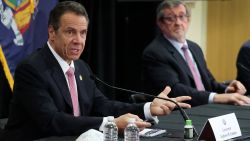 MANHASSET, NEW YORK - MAY 06:  New York Governor Andrew Cuomo speaks while President and CEO of Northwell Health Michael Dowling looks on during a Coronavirus Briefing At Northwell Feinstein Institute For Medical Research on May 06, 2020 in Manhasset, New York. (Photo by Al Bello/Getty Images)