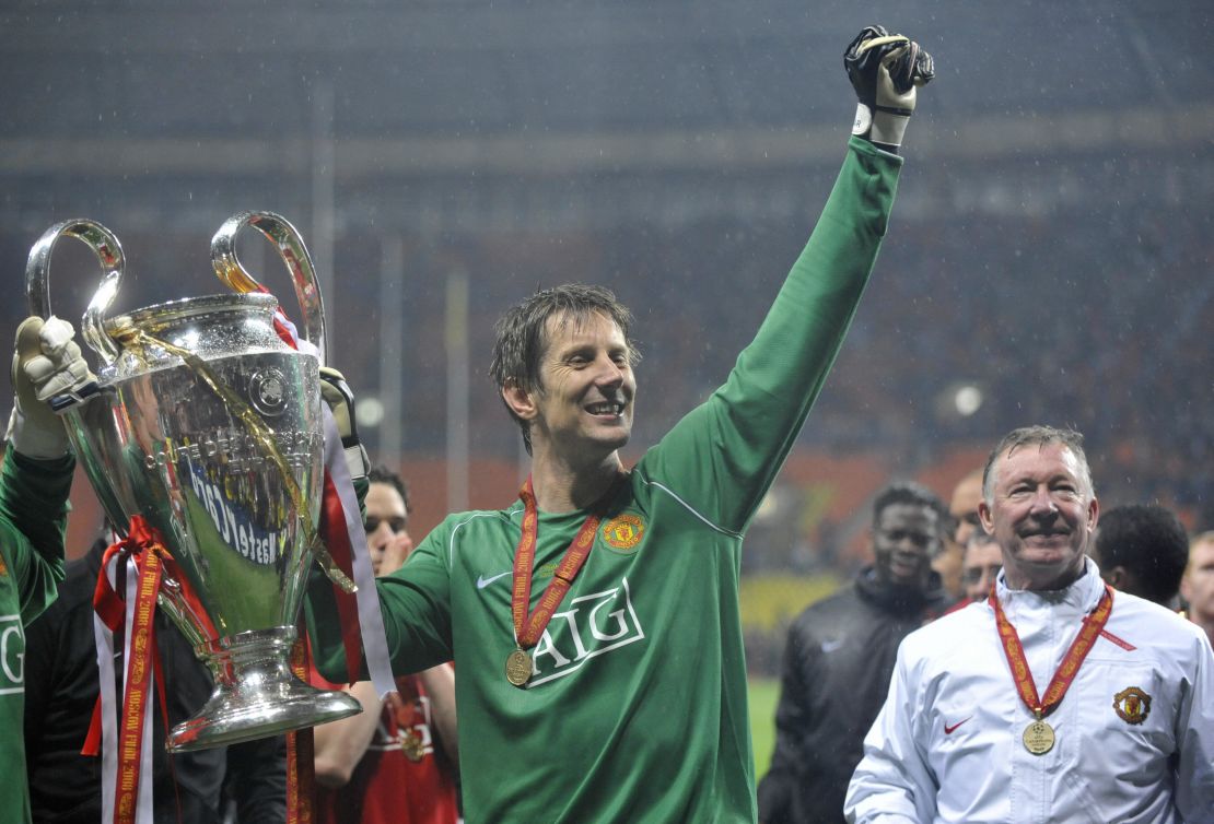 Van der Sar holds up the Champions League trophy after Manchester United beat Chelsea in the final on May 21, 2008.