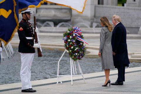 US President Donald Trump and first lady Melania Trump participate in a wreath-laying ceremony at the World War II Memorial in Washington.