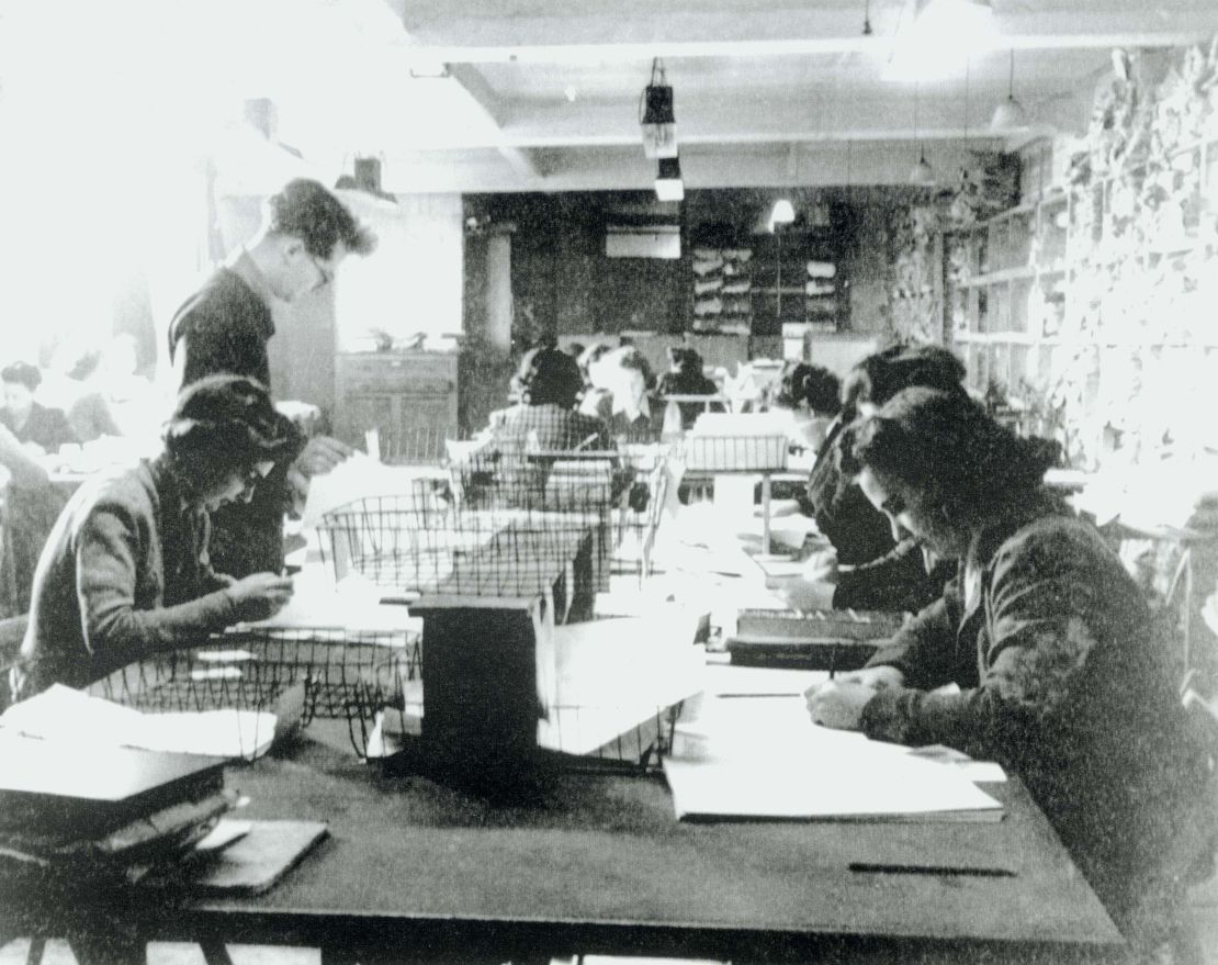 One of the Hut 3 priority teams at Bletchley Park, Buckinghamshire, where civilian and service personnel worked together at code-breaking. 