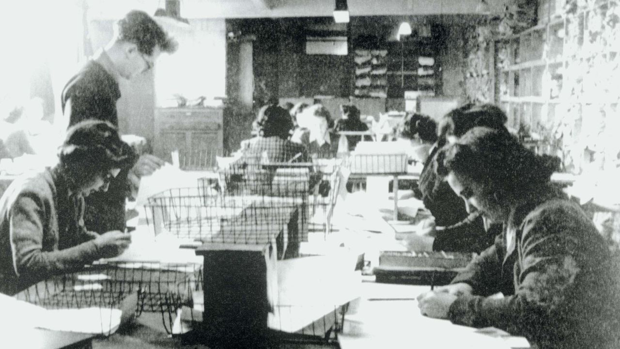 One of the Hut 3 priority teams at Bletchley Park, Buckinghamshire, where civilian and service personnel worked together at code-breaking. 
