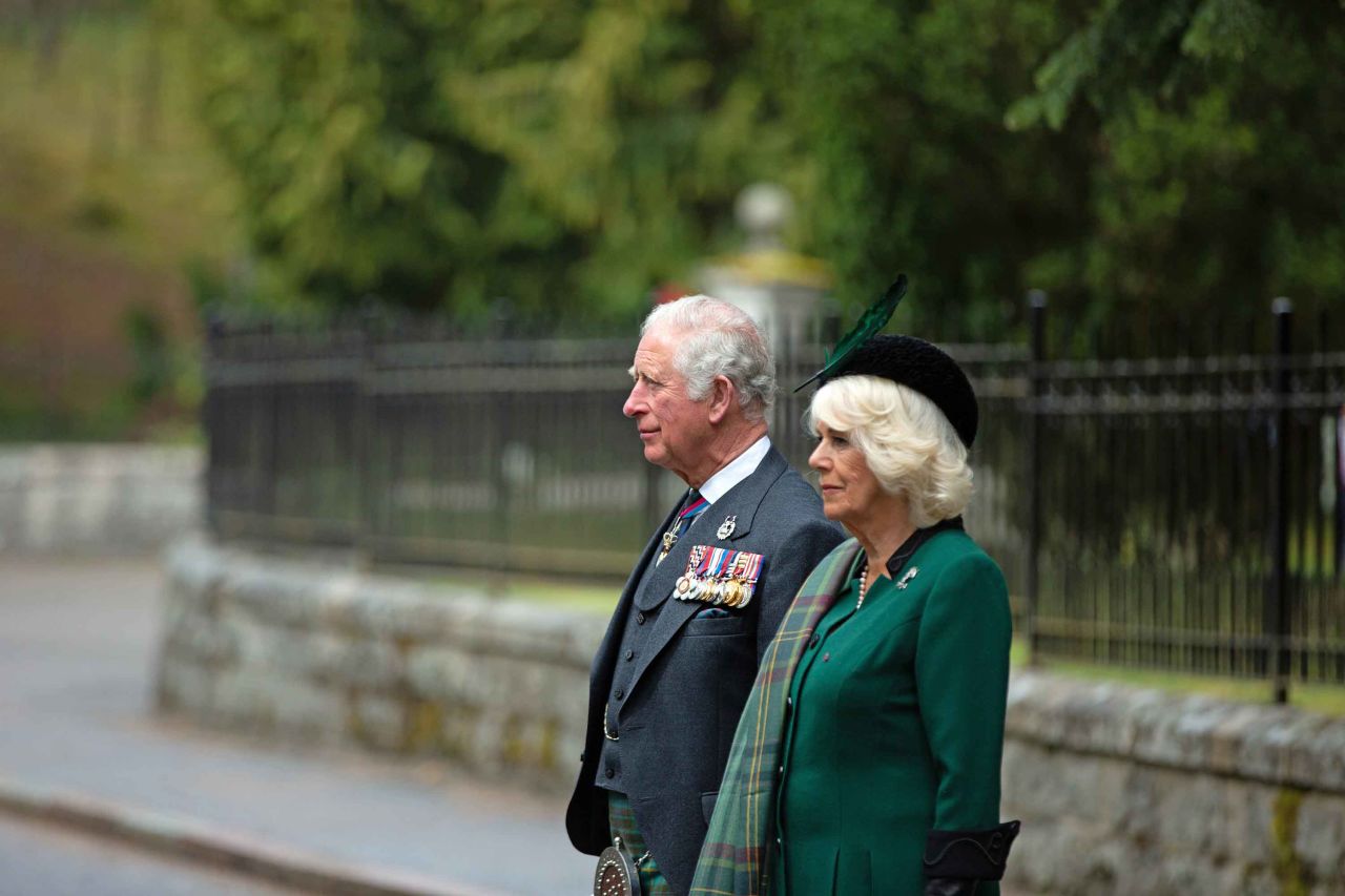 Britain's Prince Charles and his wife Camilla, the Duchess of Cornwall, take part in a two-minute silence at the Balmoral War Memorial near Crathie, Scotland.