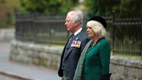 Britain's Prince Charles and his wife Camilla, the Duchess of Cornwall, take part in a two-minute silence at the Balmoral War Memorial near Crathie, Scotland.