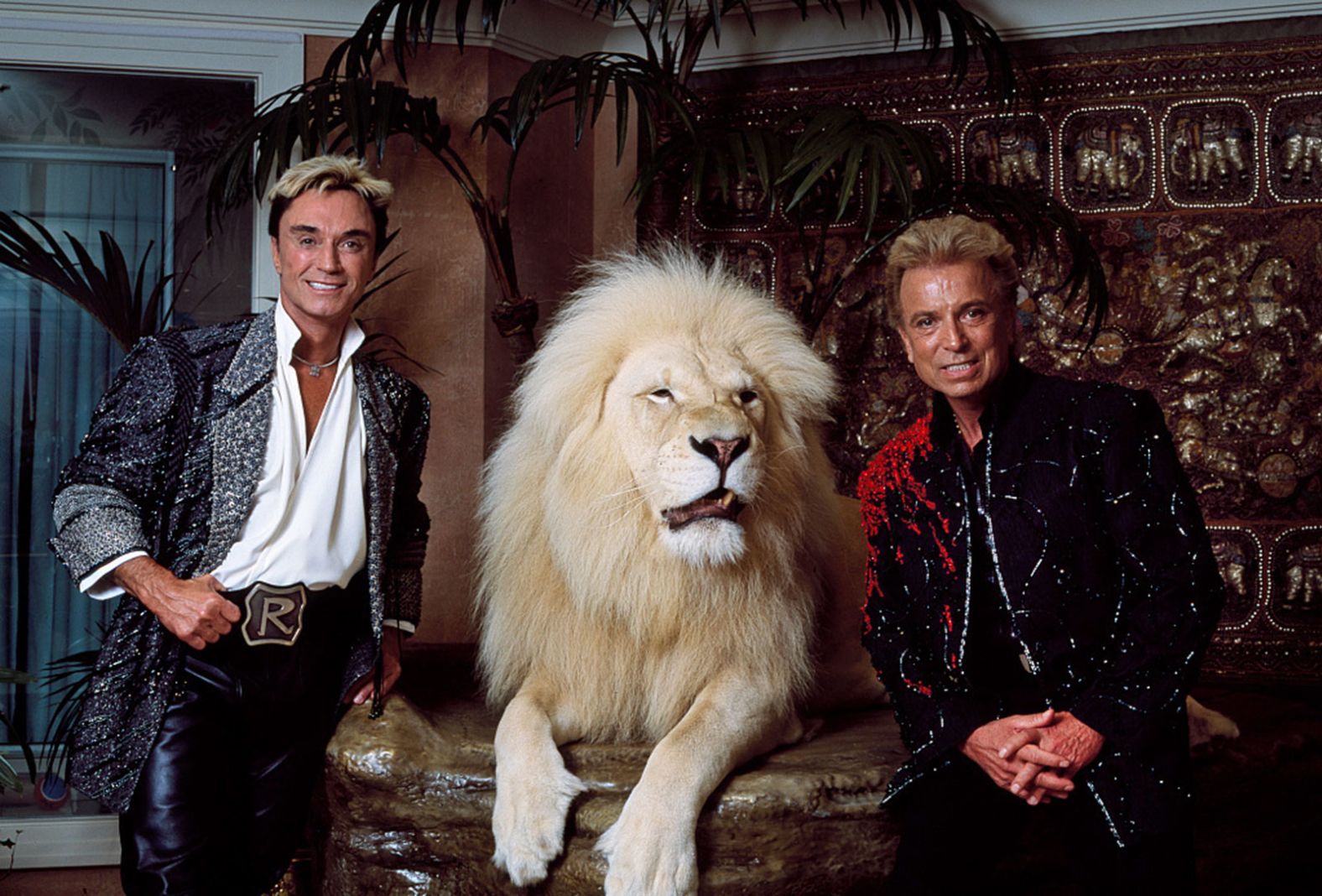 The duo poses with a lion in Las Vegas in 2003.