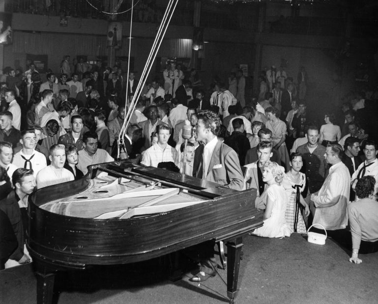 Little Richard performs on stage in 1955.