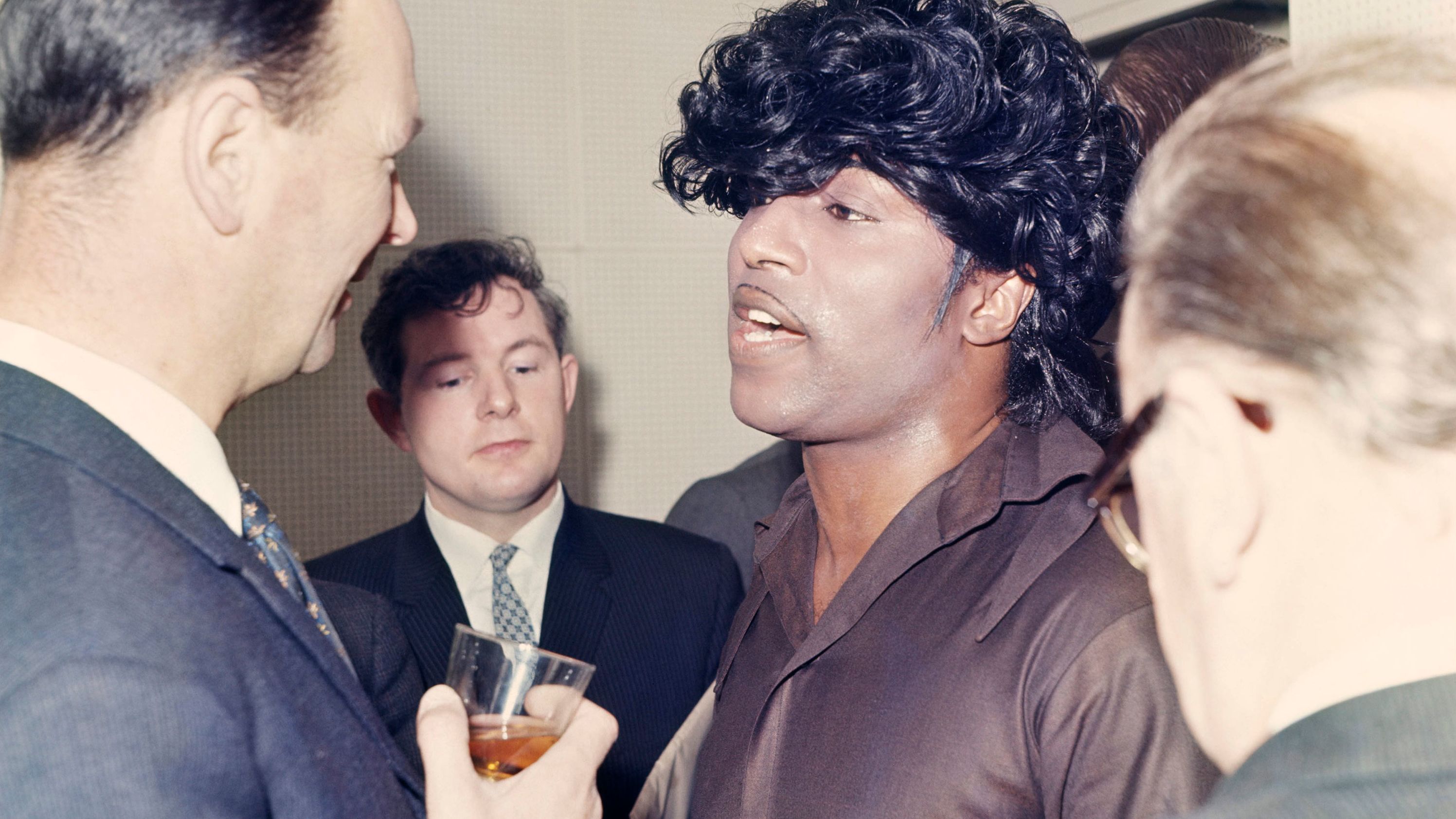 Little Richard speaks at a news conference around 1960.