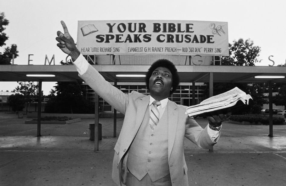 Little Richard, who became a preacher for a few years, poses for a photo with his Bible in Oakland, California, in 1981.