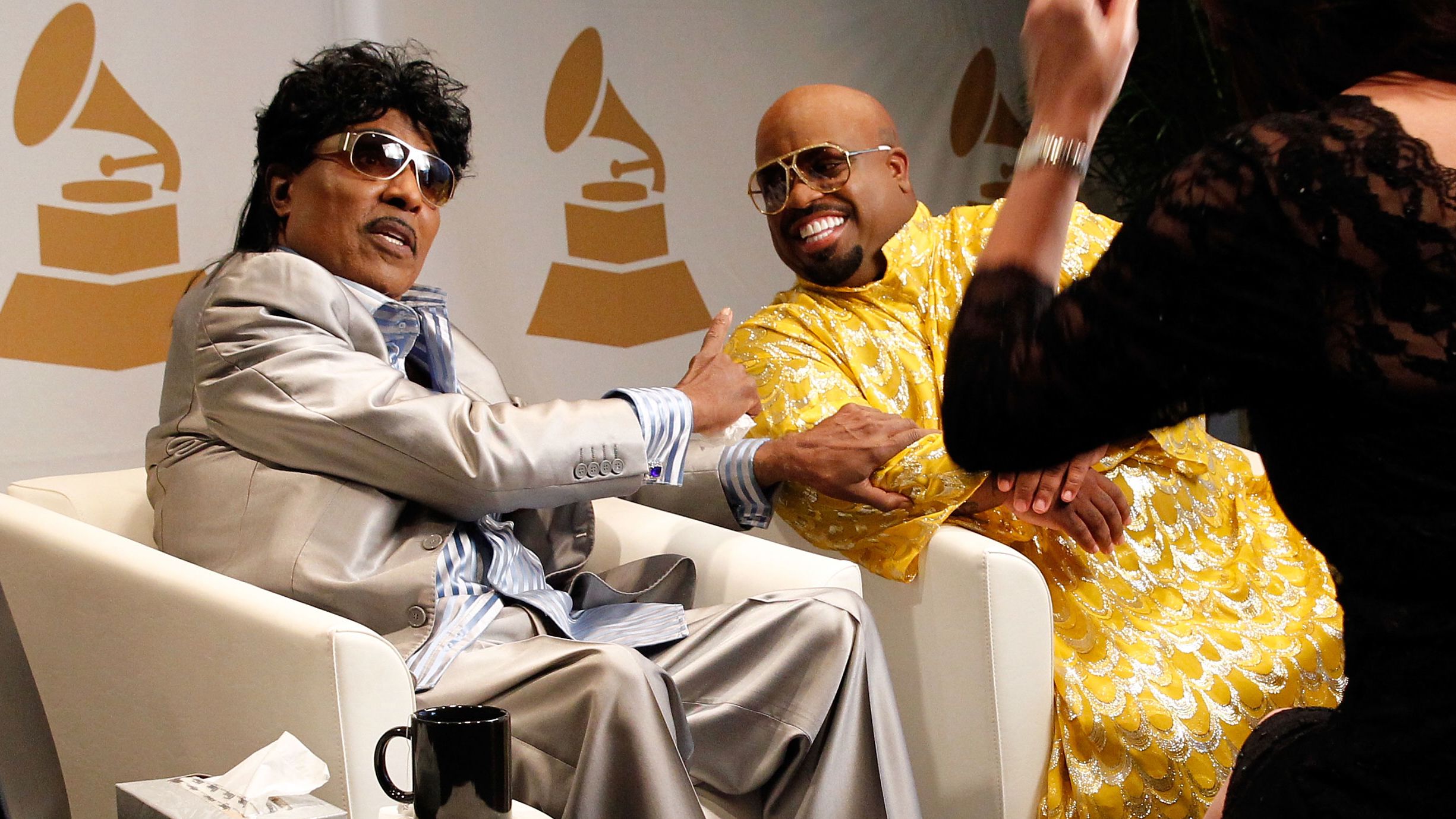 Little Richard and CeeLo Green speak during an event in Atlanta in 2013.