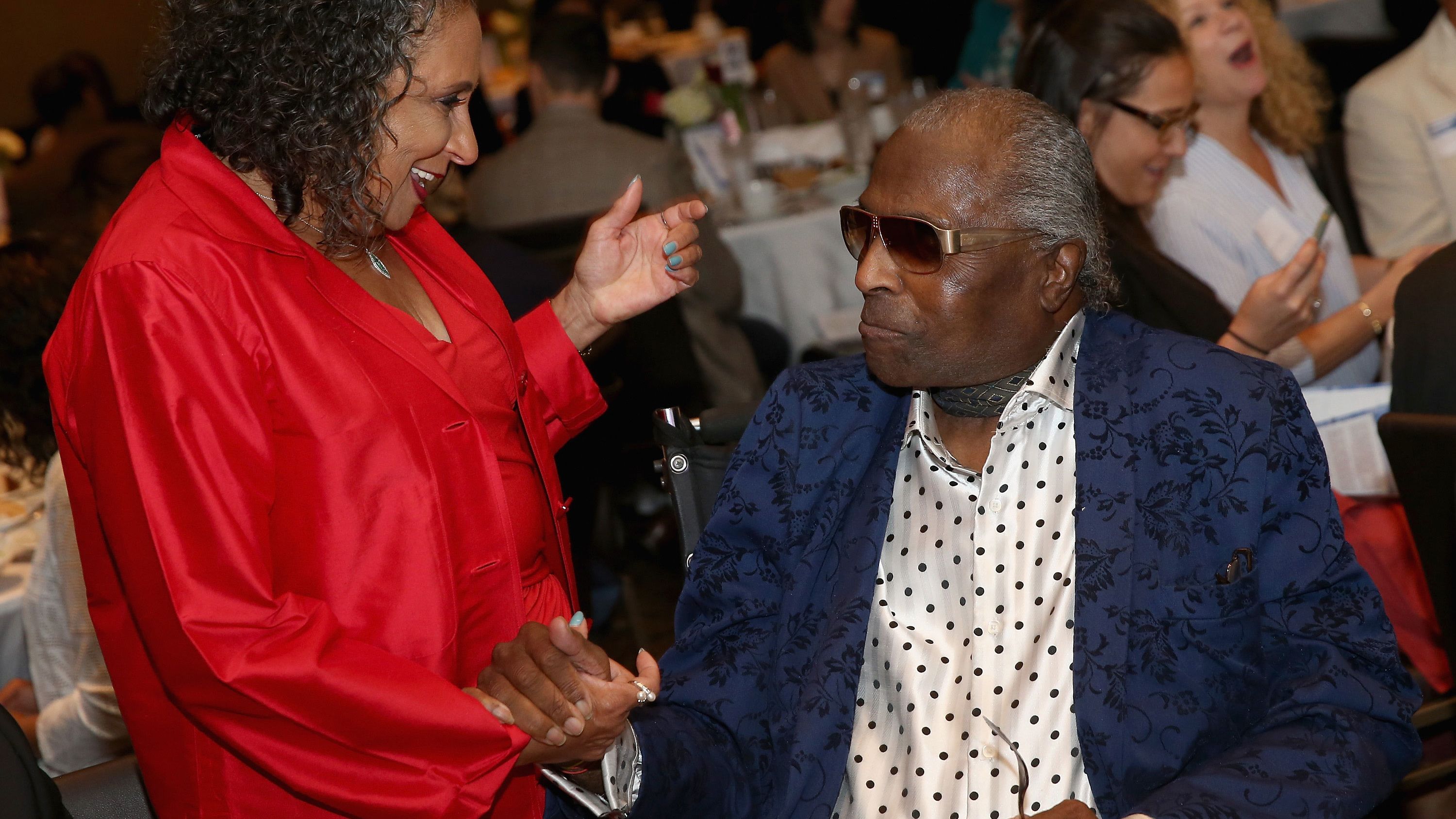 Cathy Hughes speaks with Little Richard during an event at the National Museum of African American Music in Nashville, Tennessee, in 2016.
