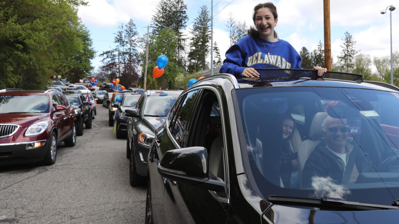 A Briarcliff High School student participates in a parade of graduating seniors through Briarcliff Manor, New York, on May 9, 2020.