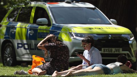 Sunbathers in London in May, during the UK's coronavirus lockdown.