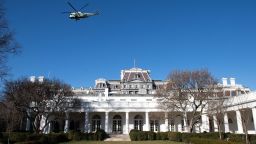 A backup helicopter to Marine One flies over the West Wing and Rose Garden of the White House as US President Donald Trump and First Lady Melania Trump depart the South Lawn in Washington, DC, February 23, 2020, as they leave on a 2-day trip to India. - Trump is heading to India for his first visit there.  United by mistrust of China, Trump's visit will see deals in defence and other areas, including potentially the supply of six nuclear reactors, the fruit of a landmark atomic accord in 2008.The visit will be big on optics, with Modi and Trump appearing at a rally at the world's largest cricket stadium and the US president and First Lady Melania watching the sunset at the Taj Mahal. (Photo by SAUL LOEB / AFP) (Photo by SAUL LOEB/AFP via Getty Images)