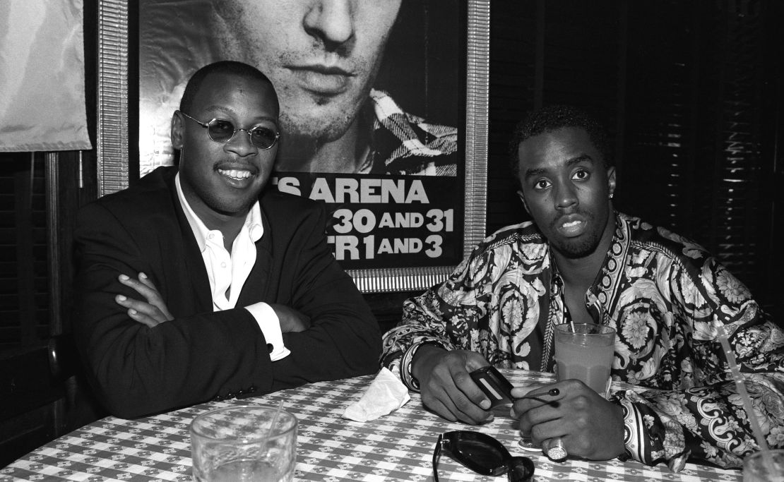 Andre Harrell, left, and Sean "Diddy" Combs pose for a photo at a party after Lifebeat's Urban Aid benefit concert at Madison Square Garden on October 5, 1995 in New York City, New York.