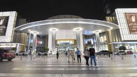 Customers outside Dubai Mall, after its re-opening.