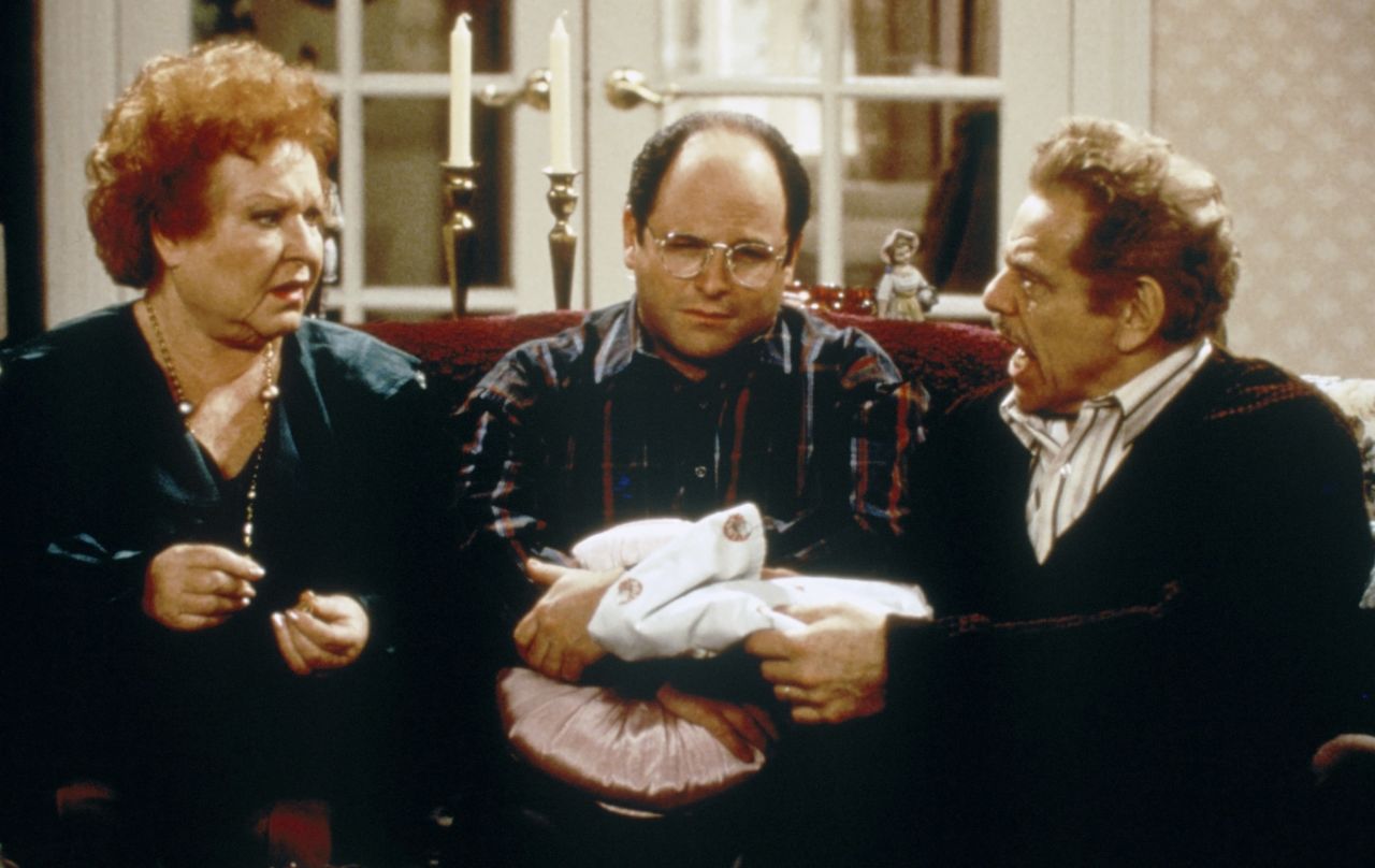 Stiller was a hit on the 90s comedy "Seinfeld," playing the curmudgeonly father of George Costanza (played by Jason Alexander, center). Estelle Harris, left, played his wife.
