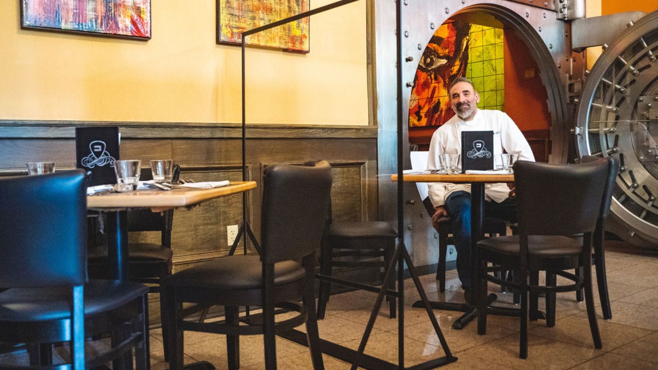 Chef Dante Boccuzzi had custom dividers built to keep customers separated at his Cleveland-area restaurant. The Michelin-starred chef and the fabricator he's working with, are also selling the dividers to other restaurants.