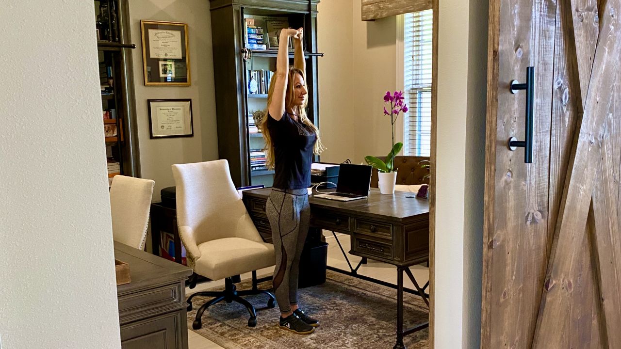Create a habit of getting out of your chair every hour for a few minutes of movement. Stretches relieve stiffness and mitigate the negative health impacts caused by sitting all day long. 