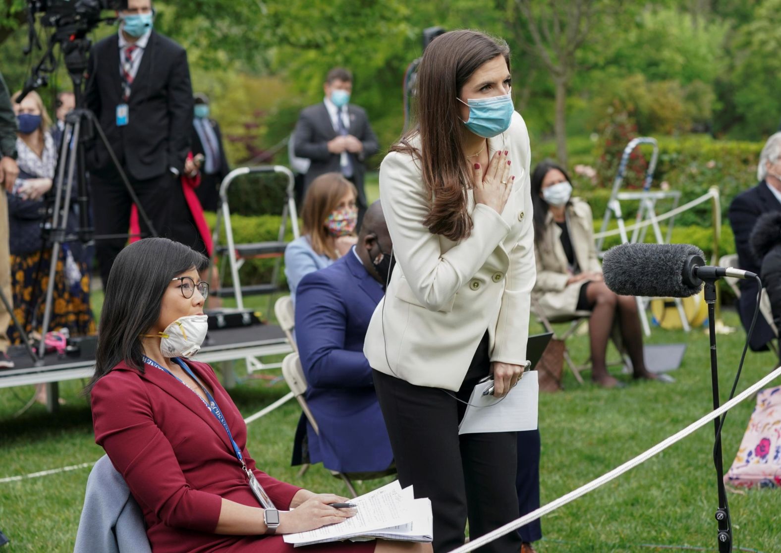 CNN White House correspondent Kaitlan Collins tries to ask Trump a question on the heels <a href="index.php?page=&url=https%3A%2F%2Fwww.cnn.com%2F2020%2F05%2F11%2Fmedia%2Ftrump-press-briefing-weijia-jian-kaitlan-collins%2Findex.html" target="_blank">of Trump's racially tinged exchange with CBS News correspondent Weijia Jiang,</a> left, at a White House briefing on May 11. Jiang asked the President why he sees coronavirus testing as a global competition when, at the time, more than 80,000 Americans had died. "Maybe that's a question you should ask China," Trump told Jiang, who was born in China and immigrated to the United States when she was 2. "Don't ask me. Ask China that question, OK?" Trump abruptly ended the briefing shortly afterward.