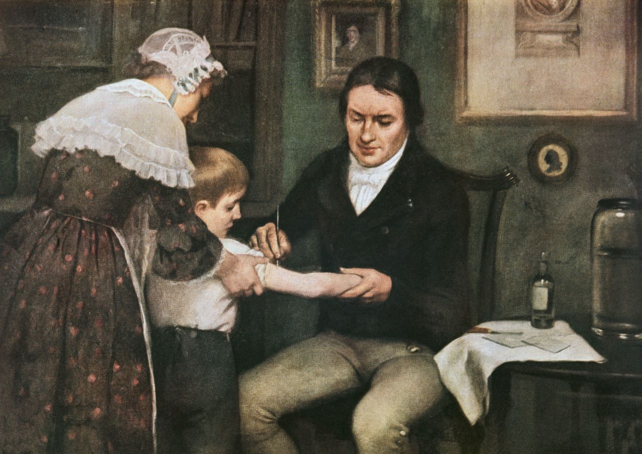 Oil on canvas by Ernest Board: Dr Edward Jenner performing his first vaccination against smallpox on James Phipps, a boy of eight.