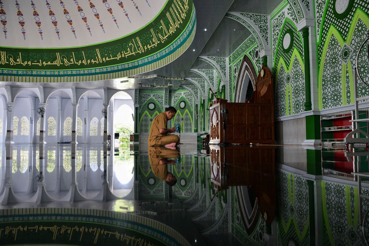 A man prays at the Al Munawarah mosque in Jantho, Indonesia, on May 12.
