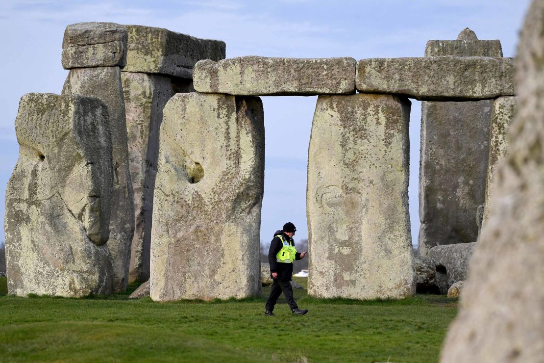  A security guard patrols around closed Stonehenge on March 20.
