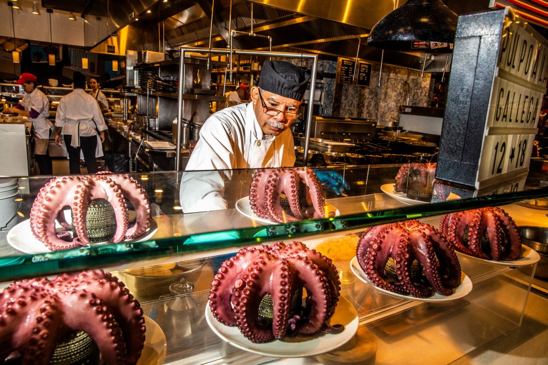 A chef working at Mercado Little Spain in Hudson Yards, New York on December 5, 2019. (David Williams for CNN)