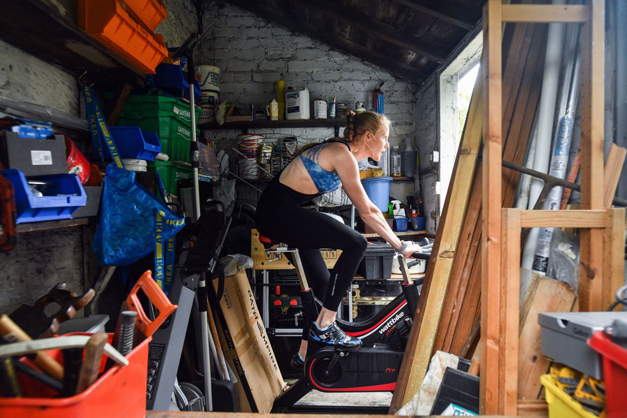 Polly Swann, a rower who won a silver medal at the 2016 Olympics, works out at home in Edinburgh, Scotland, on May 4.