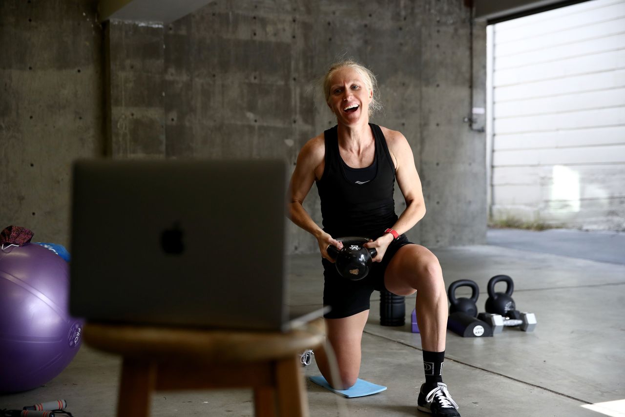 Triathlete Sarah Piampiano uses a video conference to work with her trainer, Charlie Reid, in San Rafael, California, on April 30.