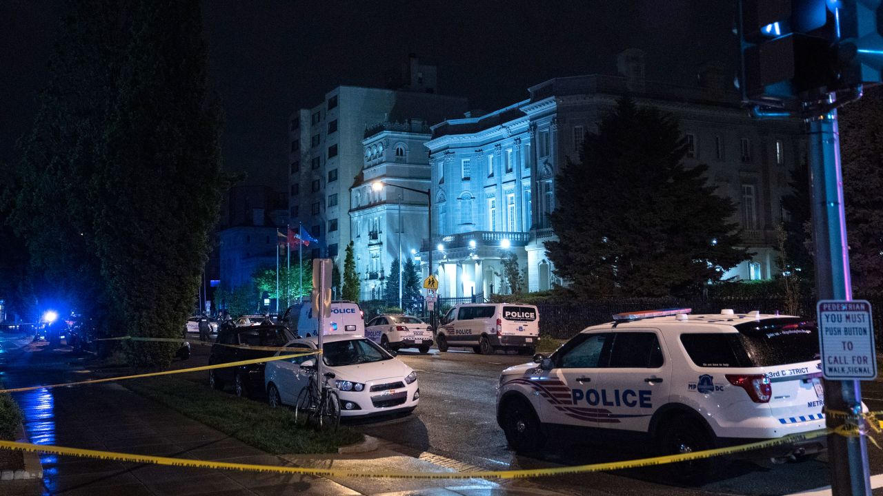 Police investigate the scene where a shooter opened fire on the Cuban Embassy on April 30, 2020 in Washington, DC. According to authorities, no injuries have been reported after a gunman used an assault rifle to open fire on the embassy early on Thursday morning.