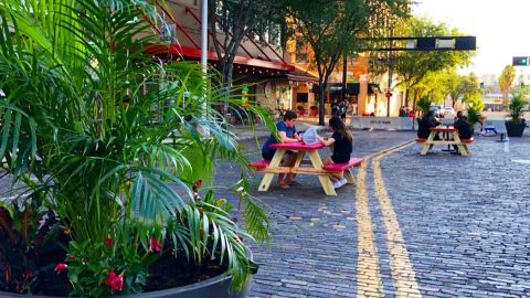 Picnic tables and plants have been added to some streets in downtown Tampa.