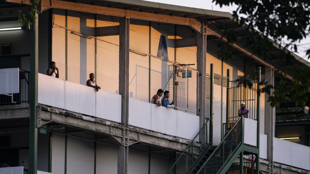 In Singapore, migrant workers can be seen in a purpose-built dormitory at an isolation area last April.