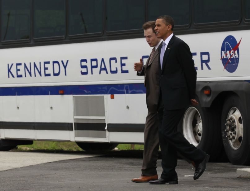 Musk walks with US President Barack Obama at Florida's Kennedy Space Center in 2010.