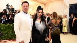 NEW YORK, NY - MAY 07:  Elon Musk and Grimes attend the Heavenly Bodies: Fashion & The Catholic Imagination Costume Institute Gala at The Metropolitan Museum of Art on May 7, 2018 in New York City.  (Photo by Jason Kempin/Getty Images)