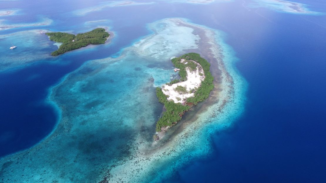 Won't you take me to Funk Caye town? This private island in Belize is one of the last available for sale in the region.