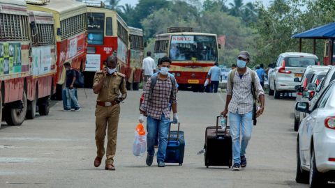 Indian citizens evacuated from Maldives arrive at the Cochin port in Kochi in the south Indian state of Kerala on May 10, 2020. 