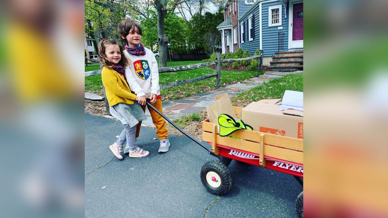 Levon, 6, and Scarlett, 3, helped deliver masks to over 100 houses.