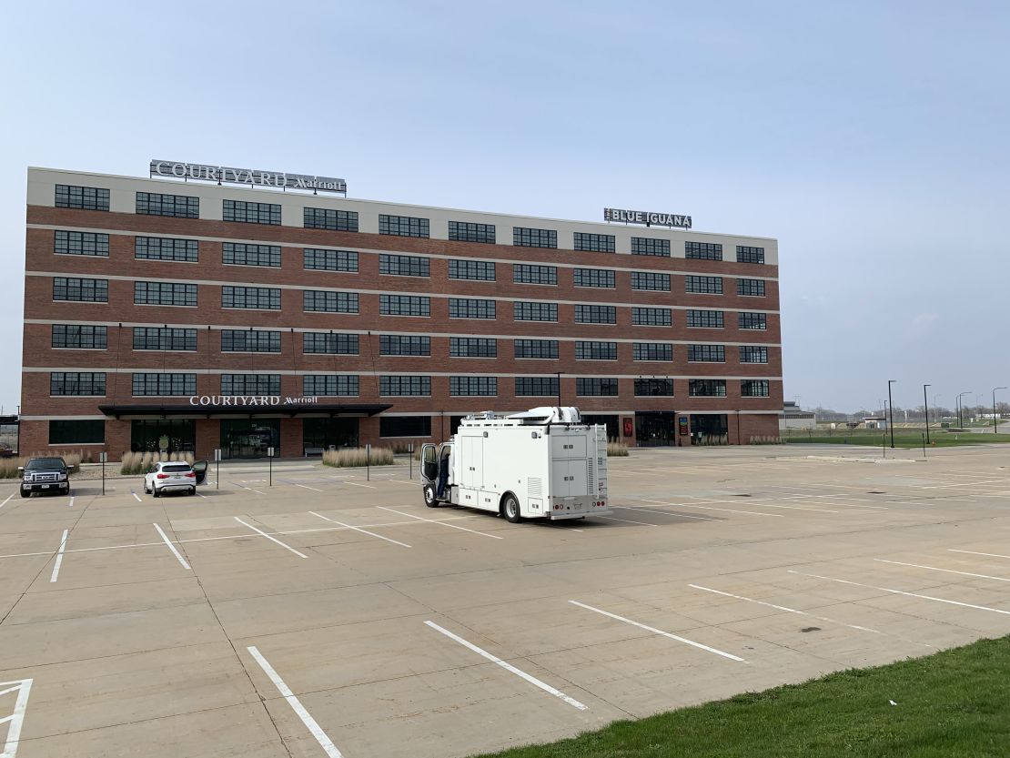 A near empty hotel parking lot in Waterloo, Iowa. The truck is CNN's.