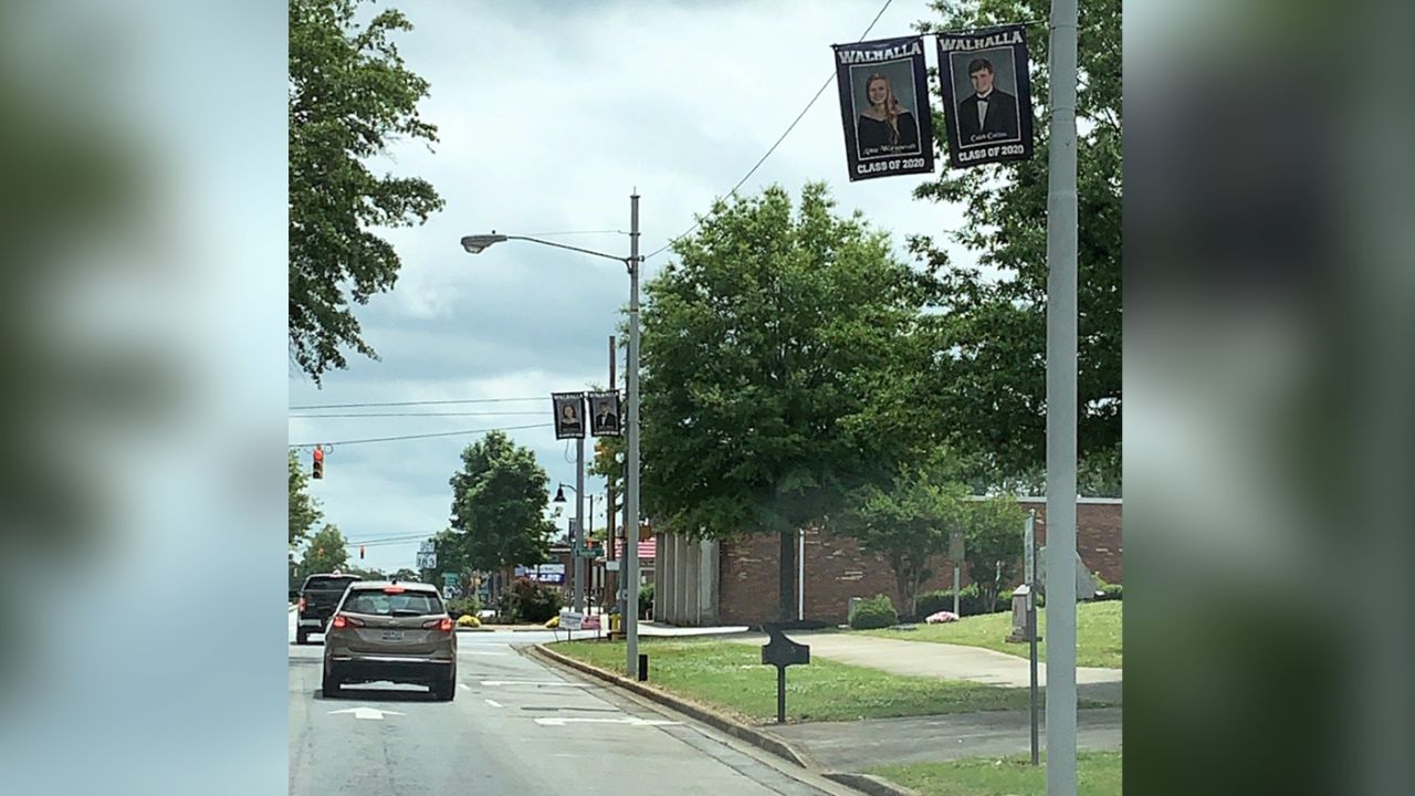 Walhalla, South Carolina, honors seniors with portraits on banners along the town's Main Street