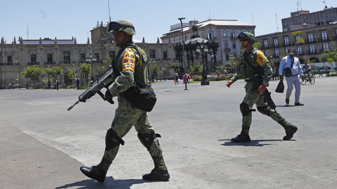 GUADALAJARA CITY, MEXICO - MARCH 27:  Elements of the National Guard patrol the streets of the Dowtown Guadalajara on March 27, 2020 in Guadalajara, Mexico. While most countries and major cities have ordered a lockdown to halt COVID-19 spread, Mexican president Lopez Obrador has not called for national quarantine yet. His critics argue he downplays on coronavirus threat as he seek to protect the economy. In Guadalajara, measures to avoid the spread of the COVID-19 have been taken, schools of all levels are closed since March 16, business around the city must shut down and many tests will be taken in people suspected to be infected. 57 cases have been confirmed in Mexican State of Jalisco.  (Photo by Refugio Ruiz/Getty Images)
