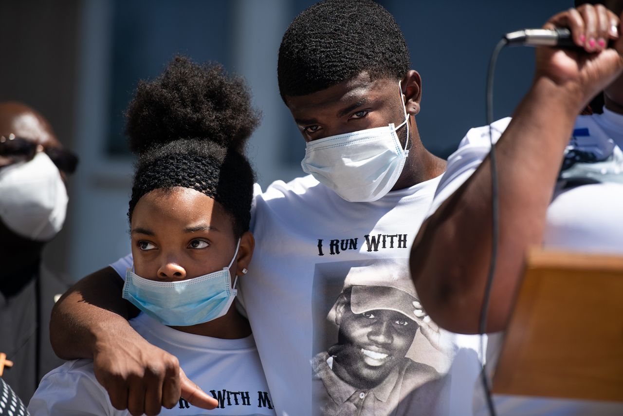 Relatives of Ahmaud Arbery embrace outside a courthouse Friday, May 8, while protesting <a href="https://www.cnn.com/2020/05/14/us/ahmaud-arbery-shooting/index.html" target="_blank">his shooting death</a> in Brunswick, Georgia. Two men have been charged with felony murder and aggravated assault in the February 23 death of Arbery, who was shot dead while jogging just outside Brunswick.