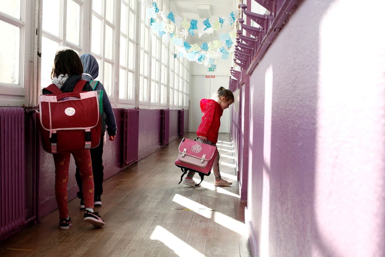 A child walks in her classroom at the Vaucanson school in Paris on Thursday, May 14. Some schools are now starting to open up in France.